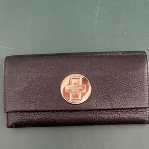 Kate Spade Black Wallet with Gold Emblem
